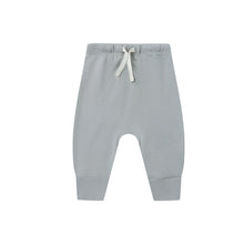 Load image into Gallery viewer, Light gray sweatpants with a drawstring on a white background