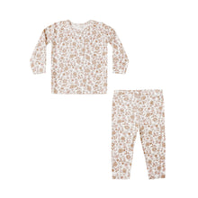 Load image into Gallery viewer, Children's pajama set with floral pattern on a white background
