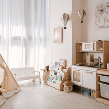 Load image into Gallery viewer, Children's playroom with toys, a teepee, and a small kitchen setup.