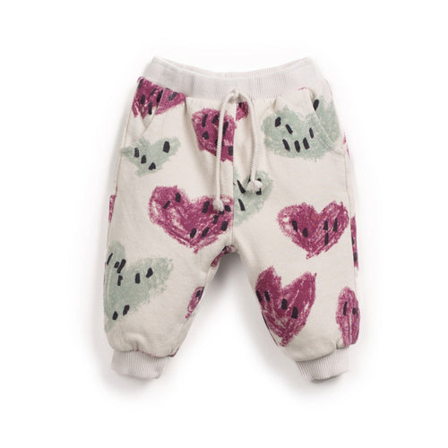 Children's pants with heart pattern on a white background