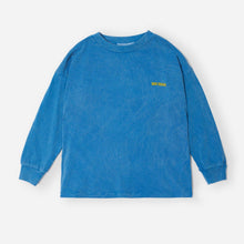 Load image into Gallery viewer, A blue long-sleeve crewneck sweatshirt with a small yellow logo on the left chest, displayed flat against a light gray background.
