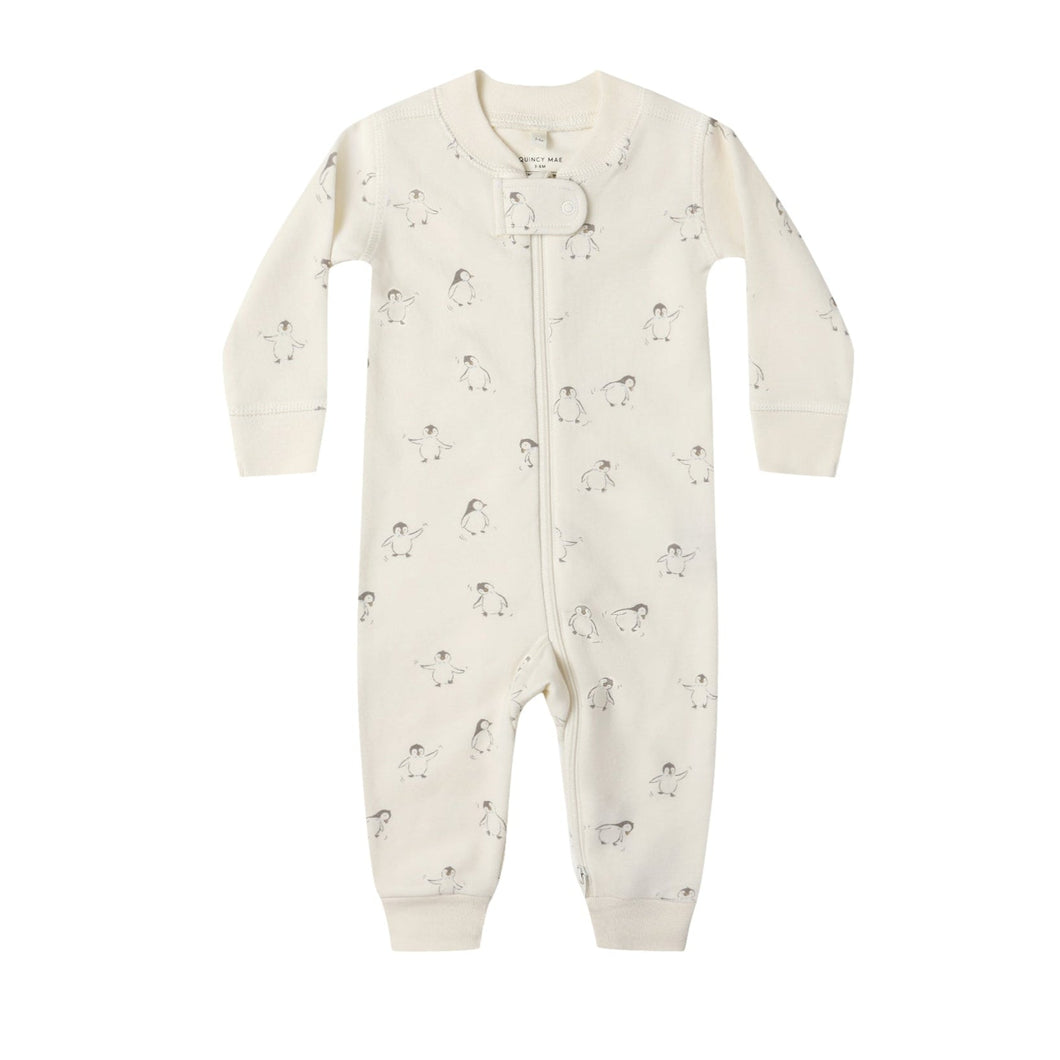 Baby onesie with subtle pattern on a white background