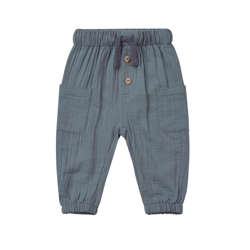 Blue children's pants with buttons on a white background