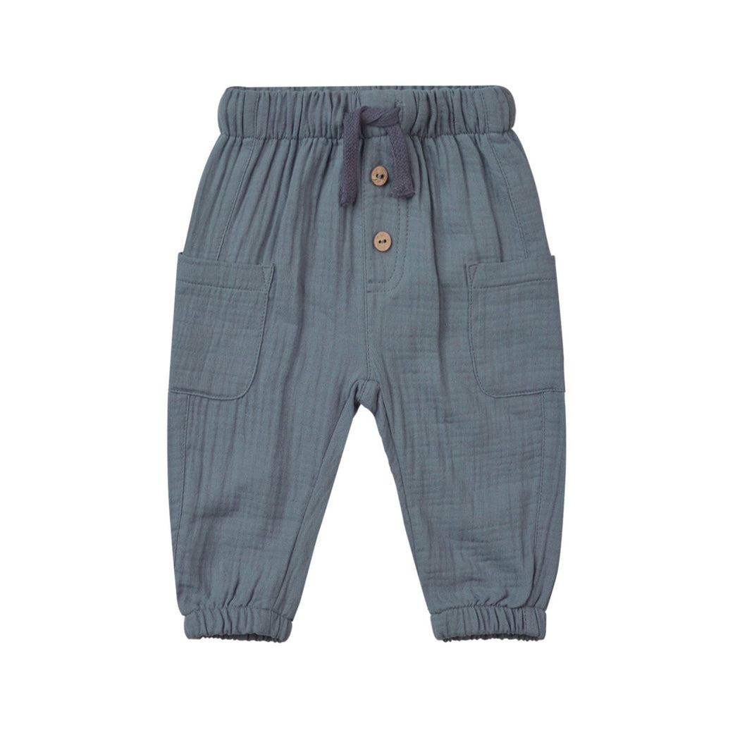 Blue children's pants with buttons on a white background