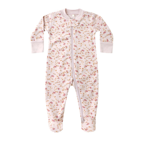 Floral patterned baby onesie on a white background