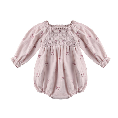Pink baby romper with puff sleeves on a white background
