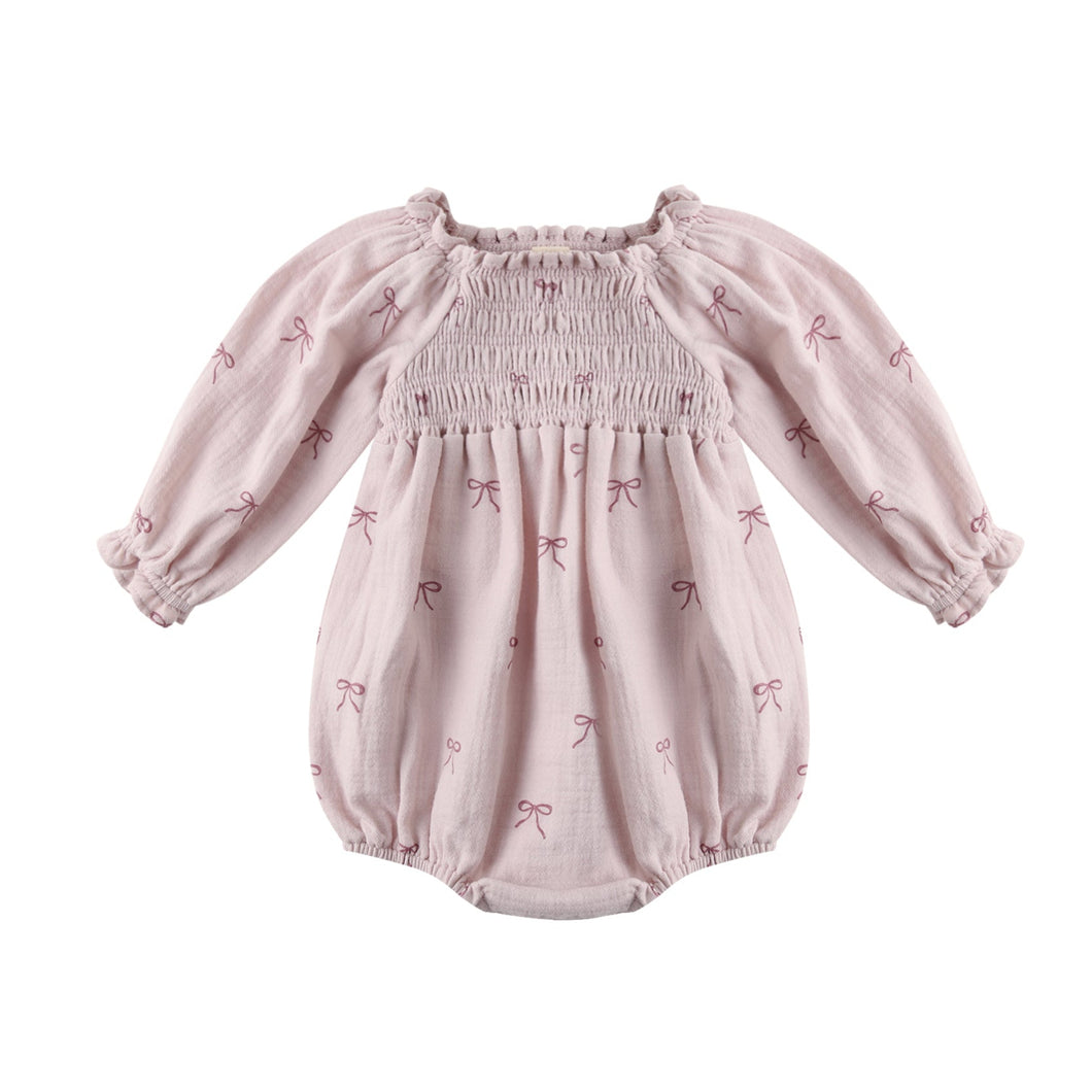 Pink baby romper with puff sleeves on a white background