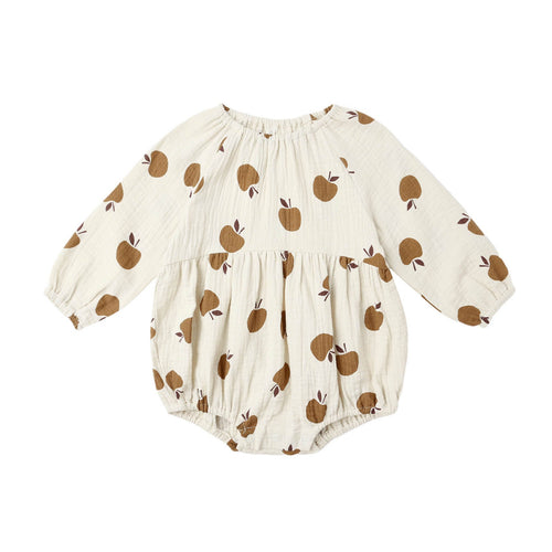 Baby romper with apple pattern on a white background